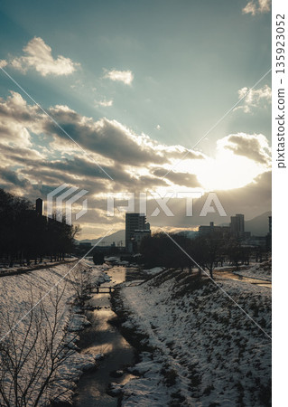 river lit by the setting sun river lit by the setting sun 135923052