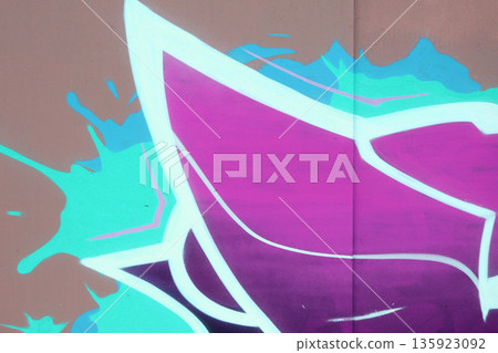 Colorful background of graffiti painting artwork with bright aerosol outlines on wall. Old school street art piece made with aerosol spray paint cans. Contemporary youth culture backdrop Colorful background of graffiti painting artwork with bright aerosol outlines on wall. Old school street art piece made with aerosol spray paint cans. Contemporary youth culture backdrop 135923092
