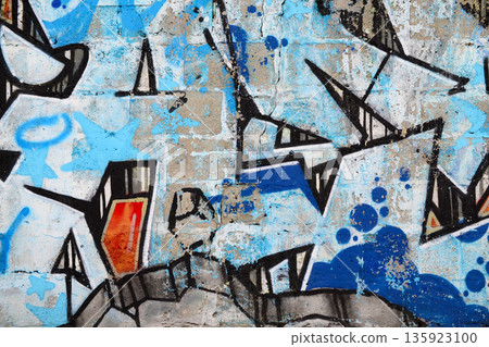 Colorful background of graffiti painting artwork with bright aerosol outlines on wall. Old school street art piece made with aerosol spray paint cans. Contemporary youth culture backdrop 135923100