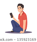 Young man smiling and holding a smartphone while sitting on the floor. Illustration. 135923169