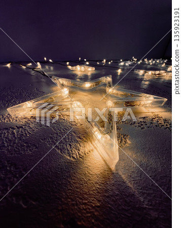 Bright Star Lanterns Cast Enchanting Glow Over Icy Fields During Festivities 135923191