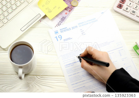 Accountant fill french tax form 2042 NR departure abroad or return to France in end of tax period. Taxation and paperwork routine in France 135923363