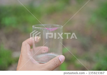 dirty lipstick stain on glass from using. stain for cleaning concept. dirty lipstick stain on glass from using. stain for cleaning concept. 135923367