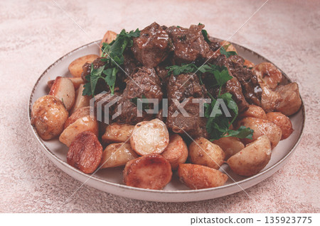kuyrdak, roast offal with potatoes and fresh herbs, homemade in Kazakh, no people, kuyrdak, roast offal with potatoes and fresh herbs, homemade in Kazakh, no people, 135923775
