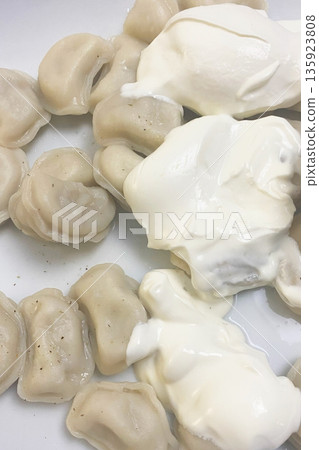 Delicious Pelmeni with Sour Cream 135923808