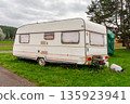 One vintage travel trailer in green campsite near Slapy lake in Nova Zivohost, Czech Republic. 135923941