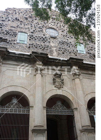 The church of San Agustin. Is a Catholic temple located in the El Raval in Barcelona on the Placa de Sant Agusti street in historical center. 135924158