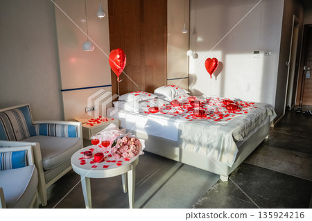Room Decorated with Roses Desserts and Heart Balloons Room Decorated with Roses Desserts and Heart Balloons 135924216