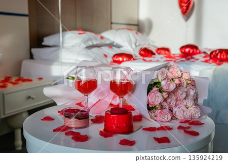 Table with Glasses Desserts and Roses for Celebration Table with Glasses Desserts and Roses for Celebration 135924219