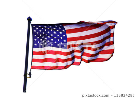 Flag of United States waving on flagpole isolated on a clean white background. American flag cutout on white 135924295