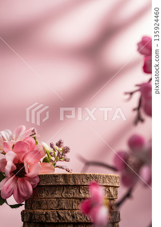 Wood podium with pink flowers on soft pastel background 135924460