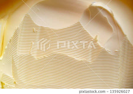 Yellow butter background and texture. Butter texture background. High quality photo Yellow butter background and texture. Butter texture background. High quality photo 135926027