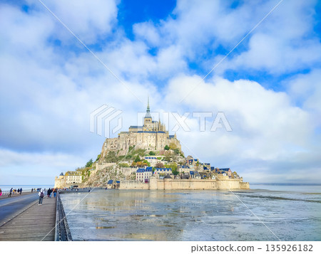 Historic Mont Saint-Michel island with medieval architecture and tidal waters Historic Mont Saint-Michel island with medieval architecture and tidal waters 135926182