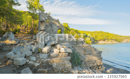 Remains of building walls in the ruins of the ancient city of Phaselis in Lycia in modern Turkey. Remains of building walls in the ruins of the ancient city of Phaselis in Lycia in modern Turkey. 135927065
