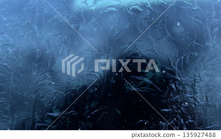 Texture of completely frozen glass stock photo for backgrounds or wallpapers. Close up of Frost Patterns on Window Texture of completely frozen glass stock photo for backgrounds or wallpapers. Close up of Frost Patterns on Window 135927488