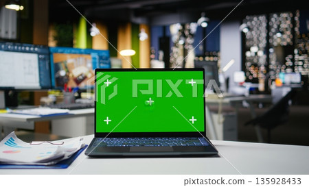 Chroma key laptop for interior design studio and modern technology, dual monitors with architectural software for modeling and visualization. Floor plans and 3D render reflecting creativity. 135928433