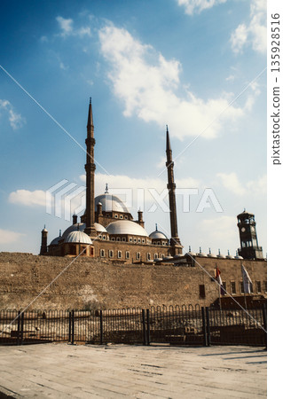 Mosque Rises In The Arabian Sky In The Morning Mosque Rises In The Arabian Sky In The Morning 135928516
