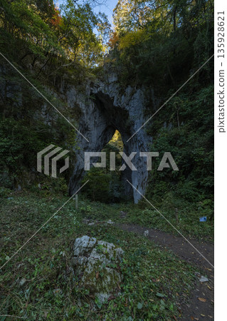 The first gate of Rashomon, a huge natural bridge and limestone cave in Kusama, Niimi City, Okayama Prefecture, Japan 135928621