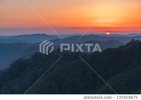 Bitchu Matsuyama Castle and the sunset sky as seen from the Unkai Observatory in Takahashi City, Okayama Prefecture, Japan Bitchu Matsuyama Castle and the sunset sky as seen from the Unkai Observatory in Takahashi City, Okayama Prefecture, Japan 135928675