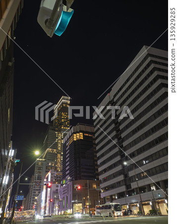 Abeno Harukas, a landmark towering into the night sky of Tennoji, Osaka, and the city's night view Abeno Harukas, a landmark towering into the night sky of Tennoji, Osaka, and the city's night view 135929285