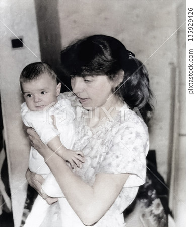 Vintage portrait of a little girl and her happy mother. Retro photo from 1994. 135929426