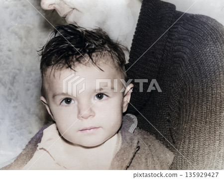A vintage portrait of a little girl and her mother. The mother dries the child after a bath. Retro photo from 1995. A vintage portrait of a little girl and her mother. The mother dries the child after a bath. Retro photo from 1995. 135929427