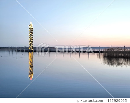 The Pegelturm observation tower on Lake Goitzschessee in the evening twilight 135929935