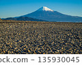Mount Fuji in the distance on the gravel of Miho Beach 135930045