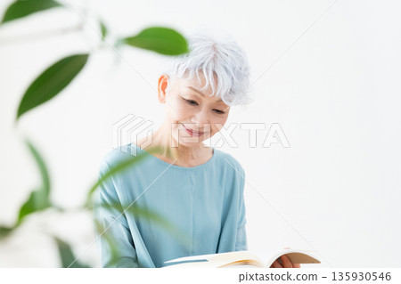 Senior woman reading 135930546