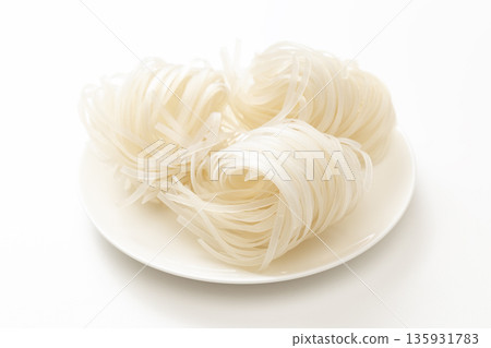 Rice noodles on white background Rice noodles on white background 135931783