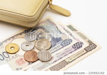 Japanese money and wallet on white background 135932142