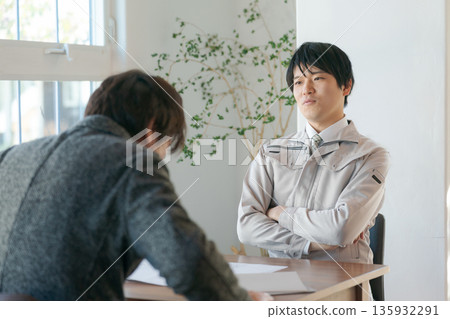 Two men having trouble Two men having trouble 135932291