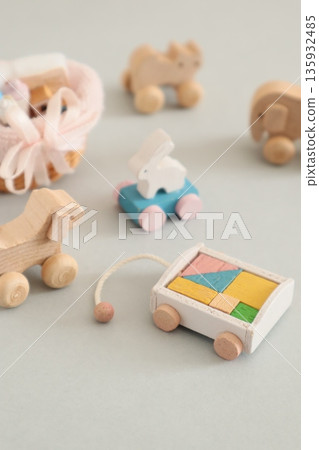 A small baby bottle, a rolling rabbit, and building blocks 135932485