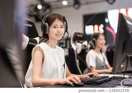 Young woman enjoying games at an e-sports tournament 135932539