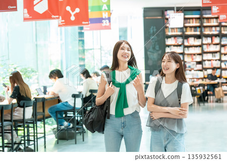 Young female college student shopping Young female college student shopping 135932561