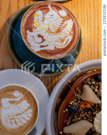 Aerial view of latte art and pancakes Aerial view of latte art and pancakes 135932586