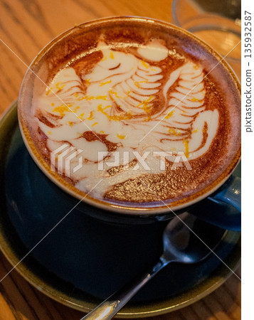 Cafe latte with latte art written Cafe latte with latte art written 135932587