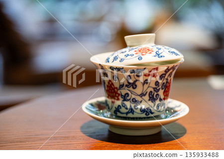 Tea cup on table in Chengdu restaurant showcasing local craftsmanship in Sichuan Tea cup on table in Chengdu restaurant showcasing local craftsmanship in Sichuan 135933488