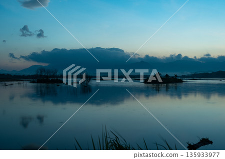 A nature view of sunset or sunrise over lake at Phang Nga Thailand A nature view of sunset or sunrise over lake at Phang Nga Thailand 135933977