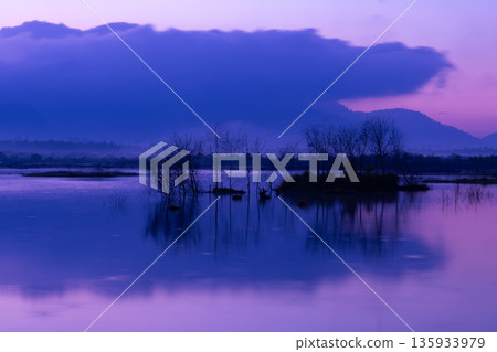 A nature view of sunset or sunrise over lake at Phang Nga Thailand A nature view of sunset or sunrise over lake at Phang Nga Thailand 135933979