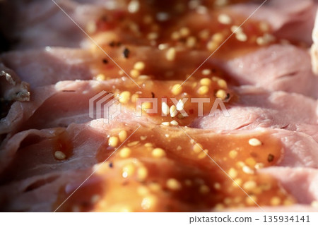 Thinly sliced roast beef with sauce Thinly sliced roast beef with sauce 135934141
