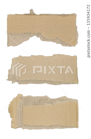 Brown corrugated kraft paper torn into pieces isolated on white background 135934172