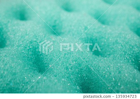Turquoise sponge surface providing soft porous texture background 135934723