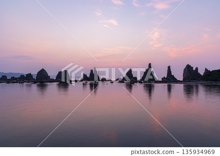 Hashigui Rocks in the early morning in Kushimoto Town, Wakayama Prefecture in summer Hashigui Rocks in the early morning in Kushimoto Town, Wakayama Prefecture in summer 135934969