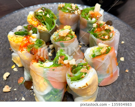 Fresh spring rolls with nuts and sauce Fresh spring rolls with nuts and sauce 135934983