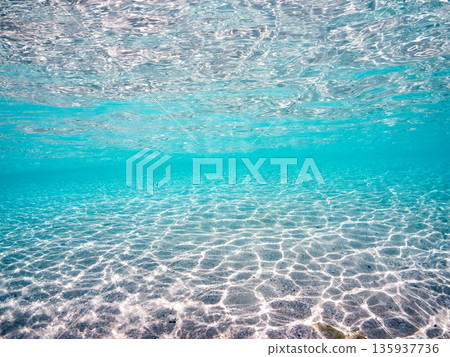 Partially submerged photograph of the white sand beaches of the Kerama Islands. Kahi Island and Amuro Island, beautiful coral reefs and schools of tropical fish. Kahi Island, Shimajiri District, Okinawa Prefecture Partially submerged photograph of the white sand beaches of the Kerama Islands. Kahi Island and Amuro Island, beautiful coral reefs and schools of tropical fish. Kahi Island, Shimajiri District, Okinawa Prefecture 135937736