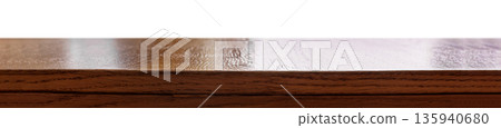 Wooden table surface with soft natural light 135940680