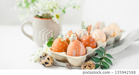 A delicate Easter background with hand-painted eggs 135942588