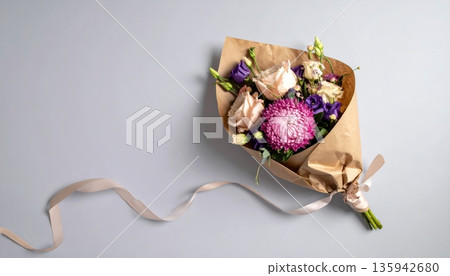 A beautiful spring arrangement of blooming white snowdrops and pink roses in a garden vase creates a floral nature decoration with lush petals and green leaves A beautiful spring arrangement of blooming white snowdrops and pink roses in a garden vase creates a floral nature decoration with lush petals and green leaves 135942680