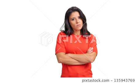 Disappointed woman with arms crossed expressing frustration 135943769